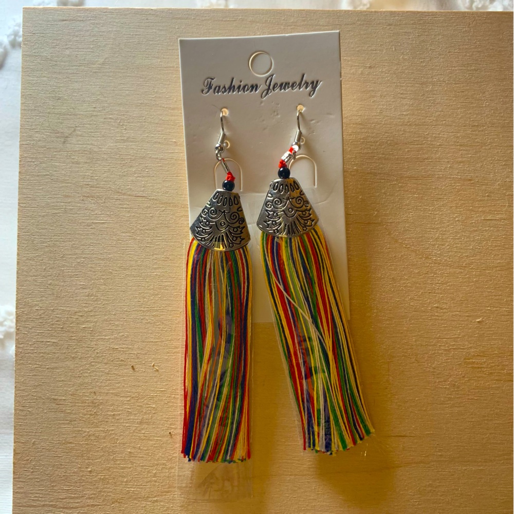 Multi-colored fringe earrings. Add some color to any outfit!